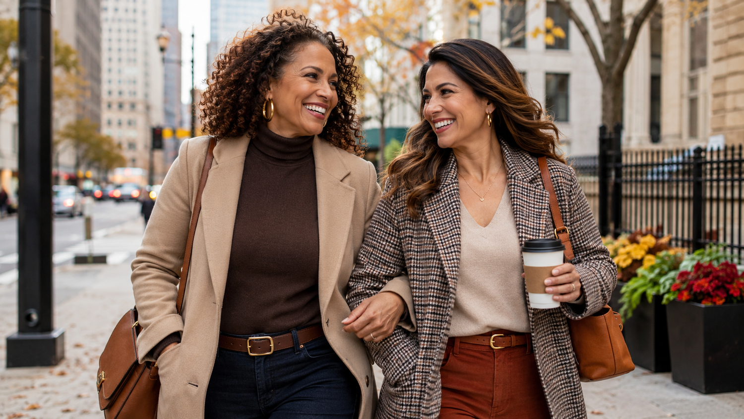 2 women smiling outside